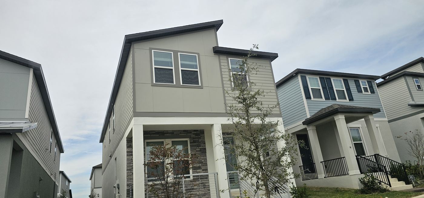 Homes with fiber-cement siding and stone accents