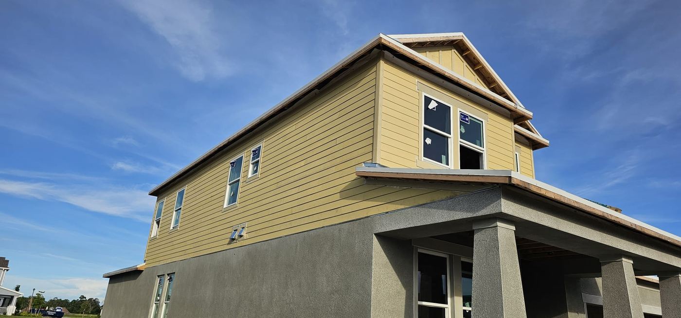 Lap siding installed on a two-story home